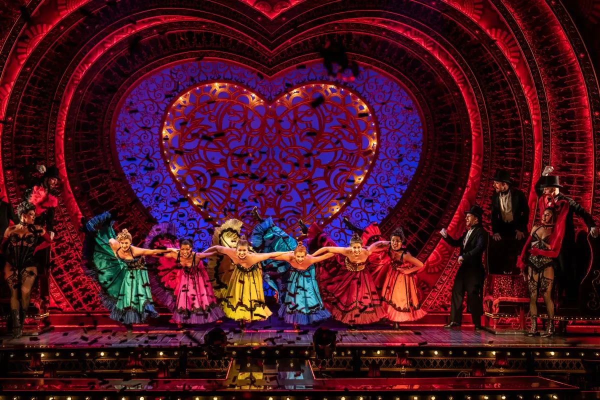 A group of people dancing on stage.