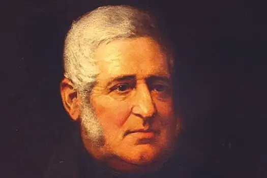 Porträt von Louis Carl Jacob in Öl. Das Bild zeigt einen ca. 60 bis 70 Jahre alten Mann mit weiß-grauen Haaren und einen Backenbart.