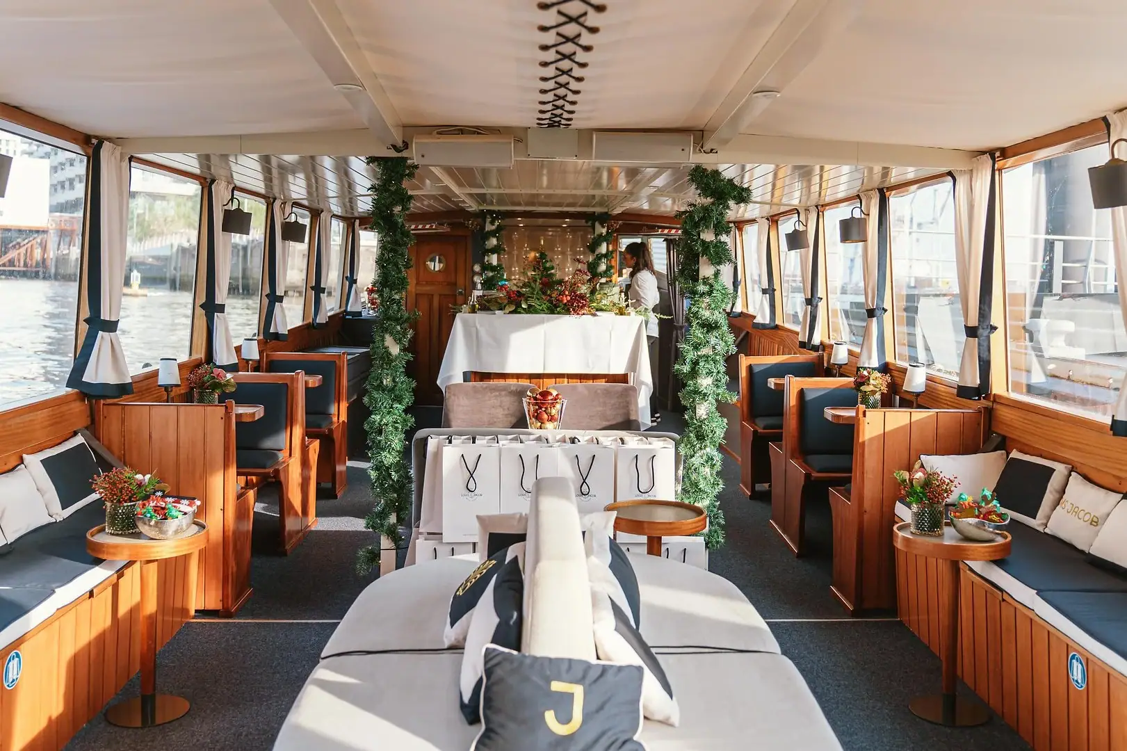 A room with a table and chairs next to it.